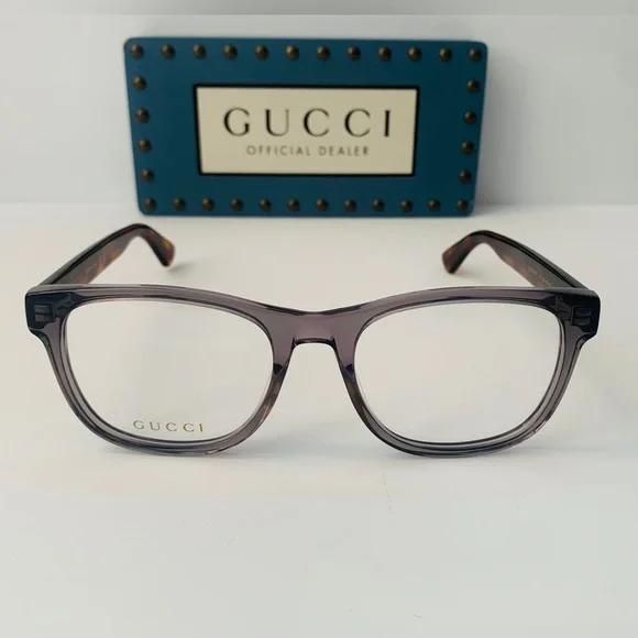 Gucci's GG0004ON features soft lines frames acetate front. Iconic web effect